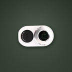 Top-down view of the SEASONS rangefinder showing the 20mm objective lens and USB-C charging port